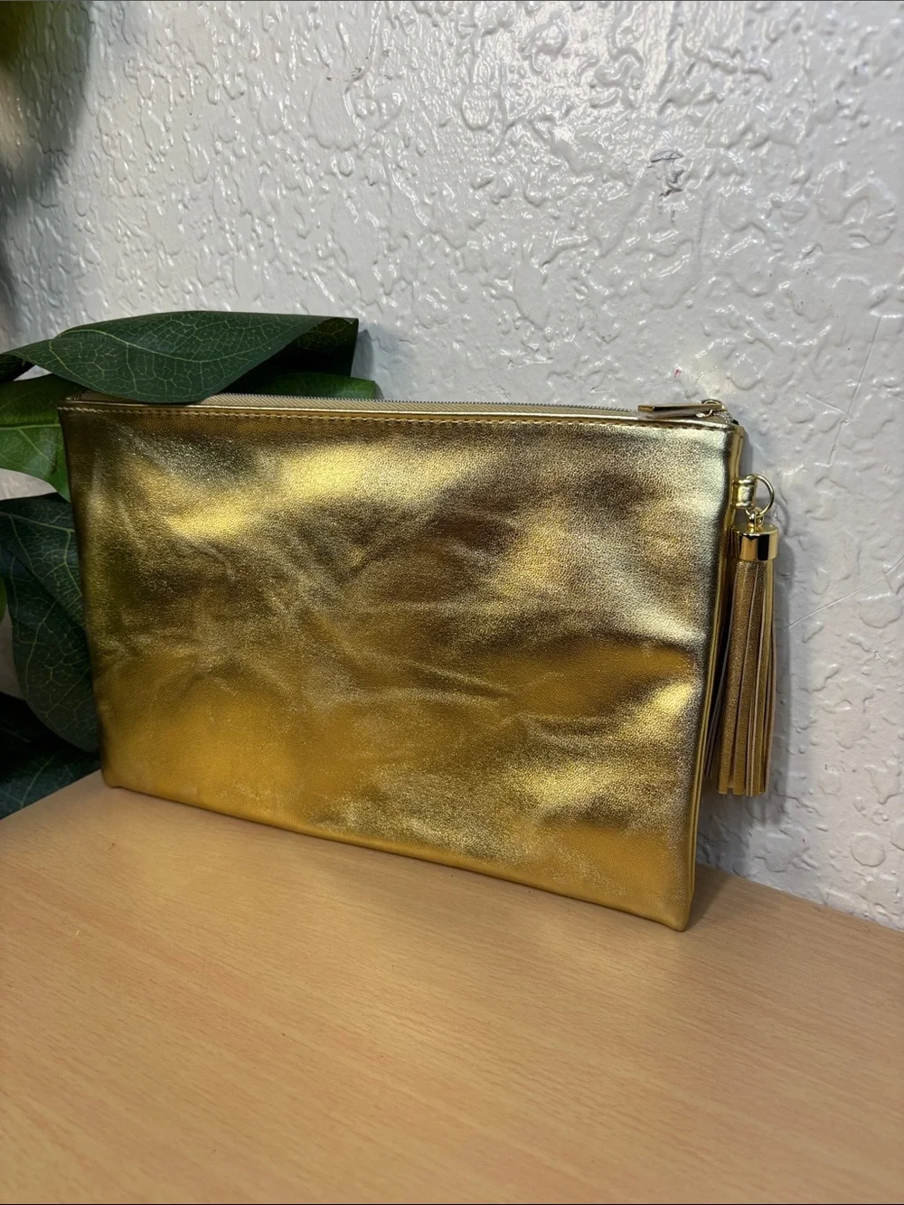 Yves Saint Laurent Metallic Gold Tassel Zip Pouch